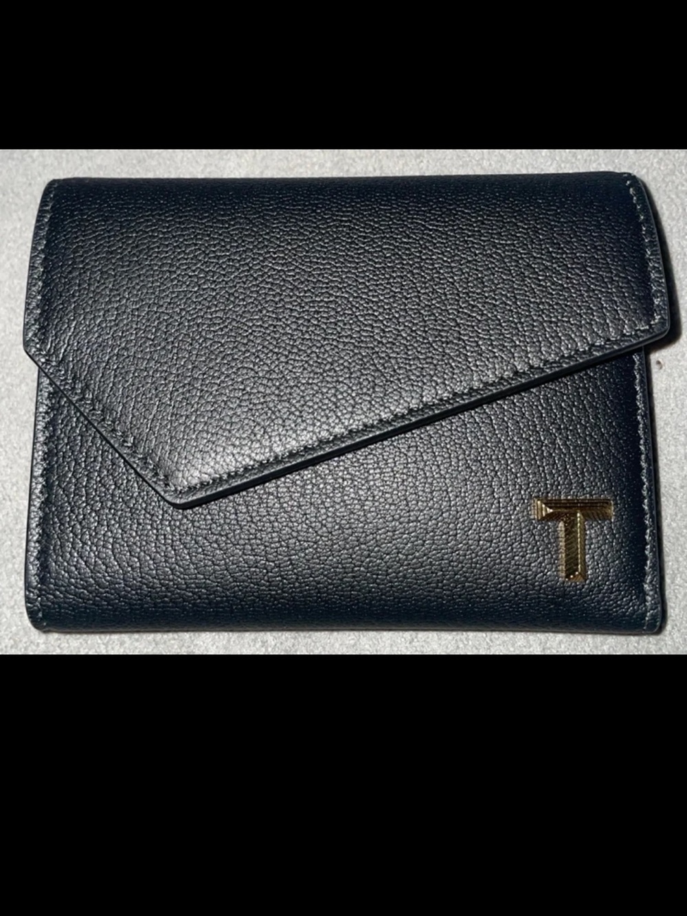 Tiffany & Co. Black Leather Wallet with Gold 'T' Accent and Blue Card